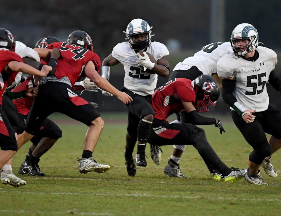 Parkside's Kerontez Bratten (22) rushes against Bennett Friday, Sept. 29, 2023, at Wicomico County Stadium in Salisbury, Maryland. Bennett defeated Parkside 22-21.