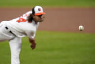 Baltimore Orioles starting pitcher Dean Kremer throws a pitch to the Tampa Bay Rays during the first inning of a baseball game, Thursday, Sept. 17, 2020, in Baltimore. (AP Photo/Julio Cortez)