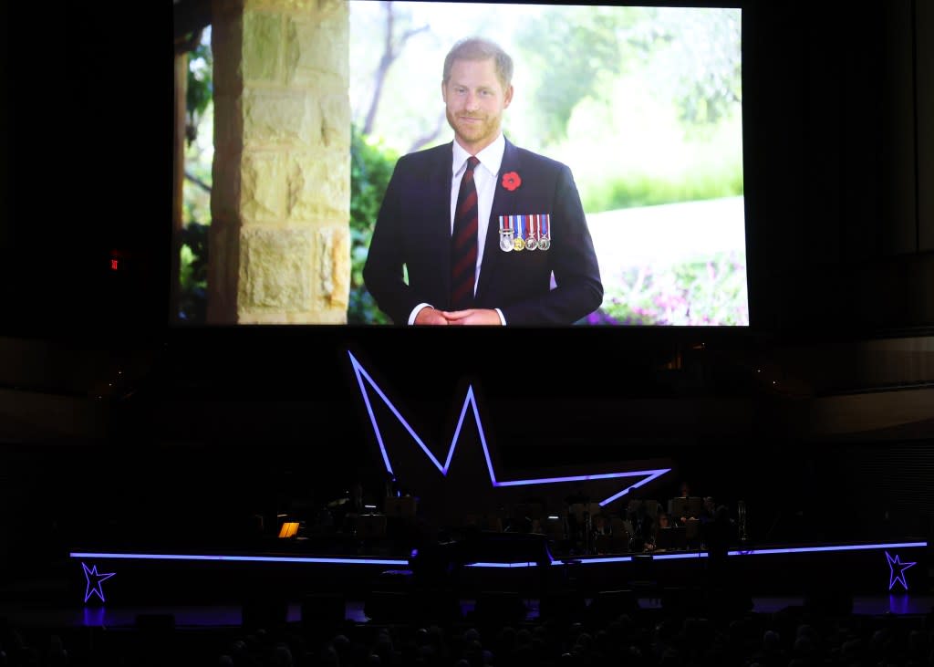 NEW YORK, NEW YORK - NOVEMBER 06: Prince Harry, Duke of Sussex appears onstage in a video message during the 17th Annual Stand Up For Heroes Benefit presented by Bob Woodruff Foundation and NY Comedy Festival at David Geffen Hall on November 06, 2023 in New York City. (Photo by Mike Coppola/Getty Images for Bob Woodruff Foundation)
