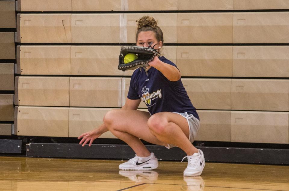 North Rockland senior catcher Olivia Leon works with Red Raider pitchers during a practice at North Rockland High School on June 7, 2023.