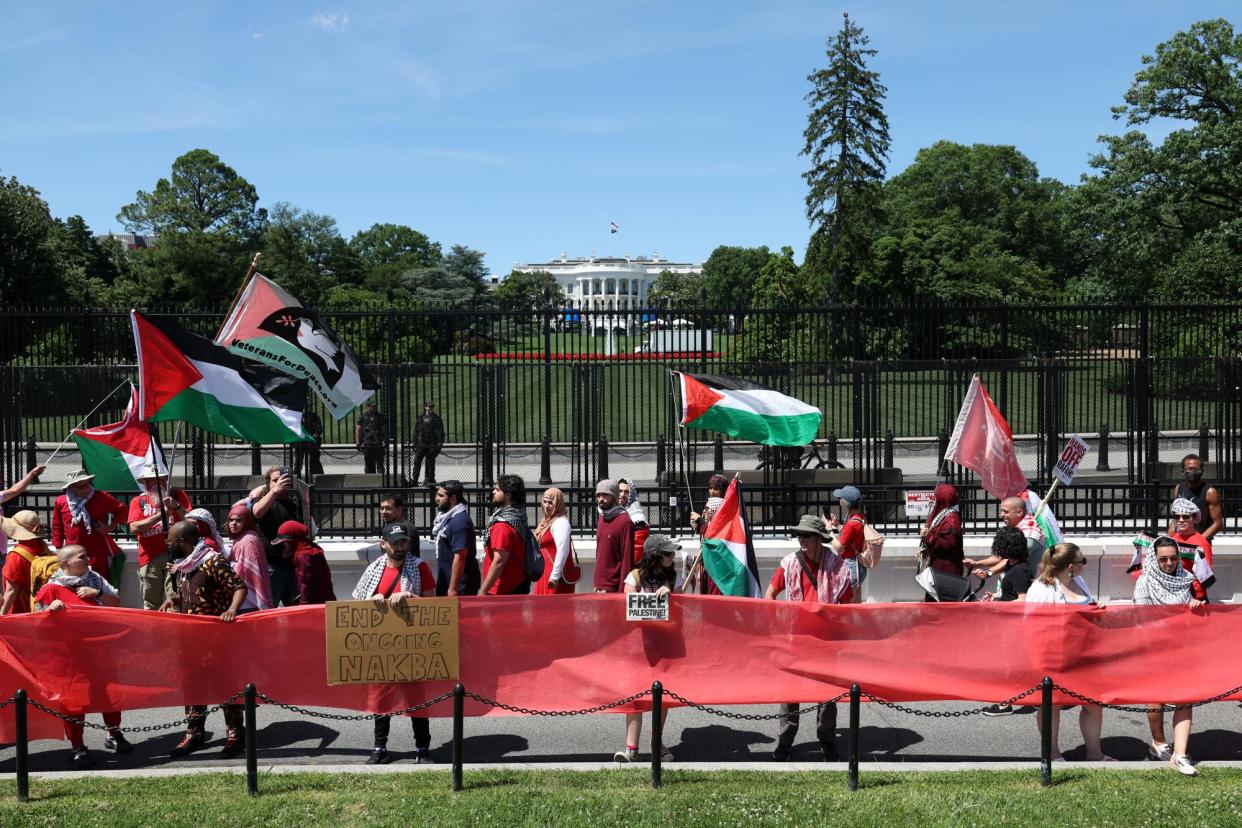 <span>Pro-Palestinian demonstrators surround the White House on 8 June 2024.</span><span>Photograph: Tom Brenner/Reuters</span>