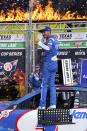 Kyle Larson (5) celebrates after winning a NASCAR Cup Series auto race at Texas Motor Speedway Sunday, Oct. 17, 2021, in Fort Worth, Texas. (AP Photo/Larry Papke)