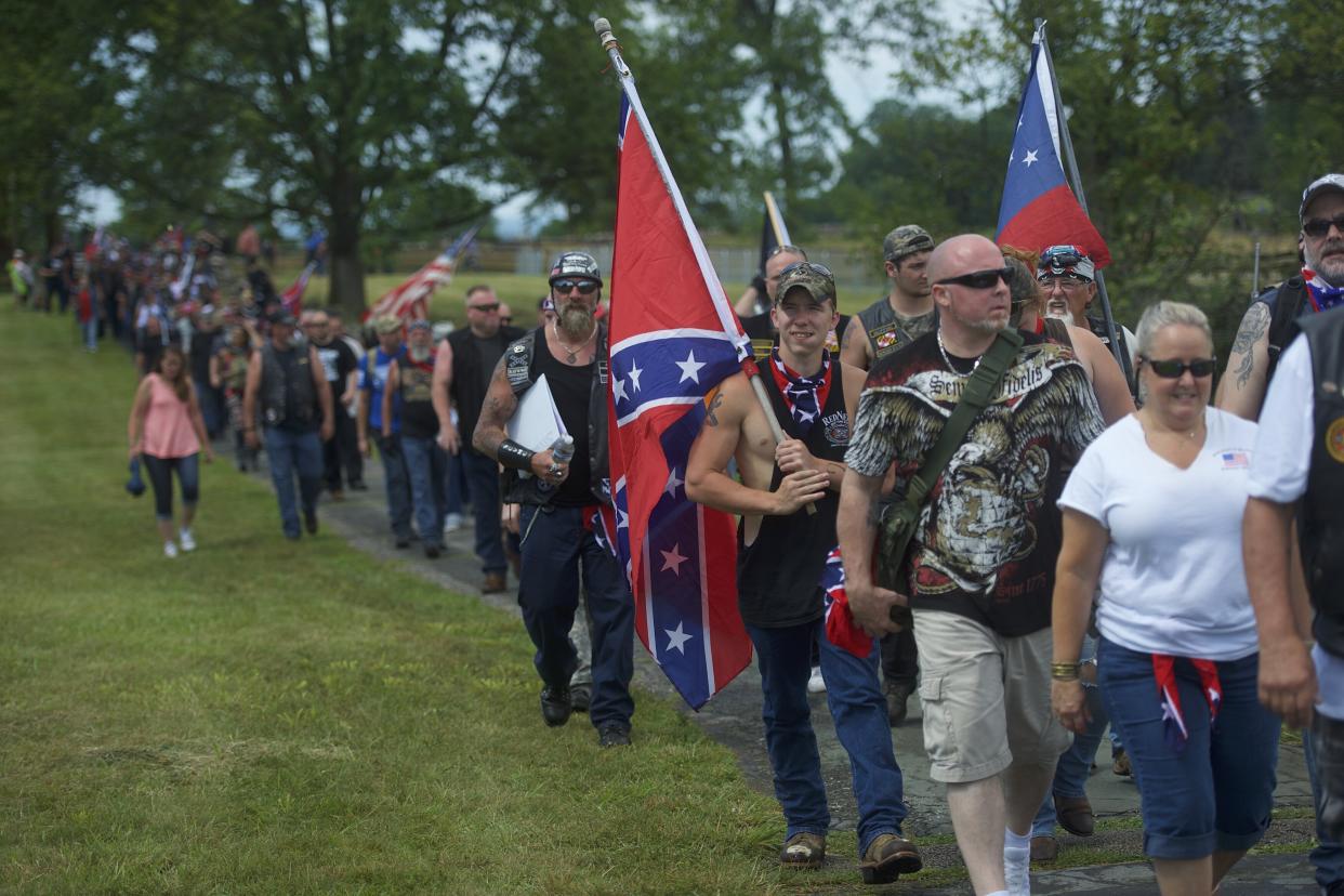 Activists holding Confederate flags gather at the Gettysburg National Military Park on July 1, 2017, in Gettysburg, Pennsylvania. The U.S. park service issued protest permits for three groups, including Sons of Confederate Veterans, on the 154th anniversary of the battle. (Photo: Mark Makela via Getty Images)