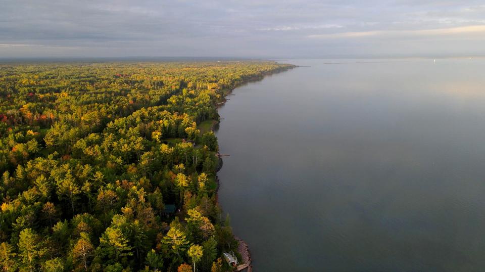 The Lake Superior shoreline on a calm fall morning in Ashland. A shift in recent years has taken place with more agencies consulting with indigenous tribes to integrate traditional ecological knowledge in land preservation. But some say that the federal government has shirked its responsibility to maintain tribal treaty rights, which protect the land and water on reservations and ceded territories.  -