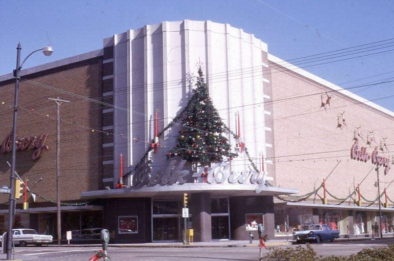 Exterior of the Belk-Beery department store decorated for Christmas in 1966, and showing the entrance at the northeast corner of Second and Chestnut streets.