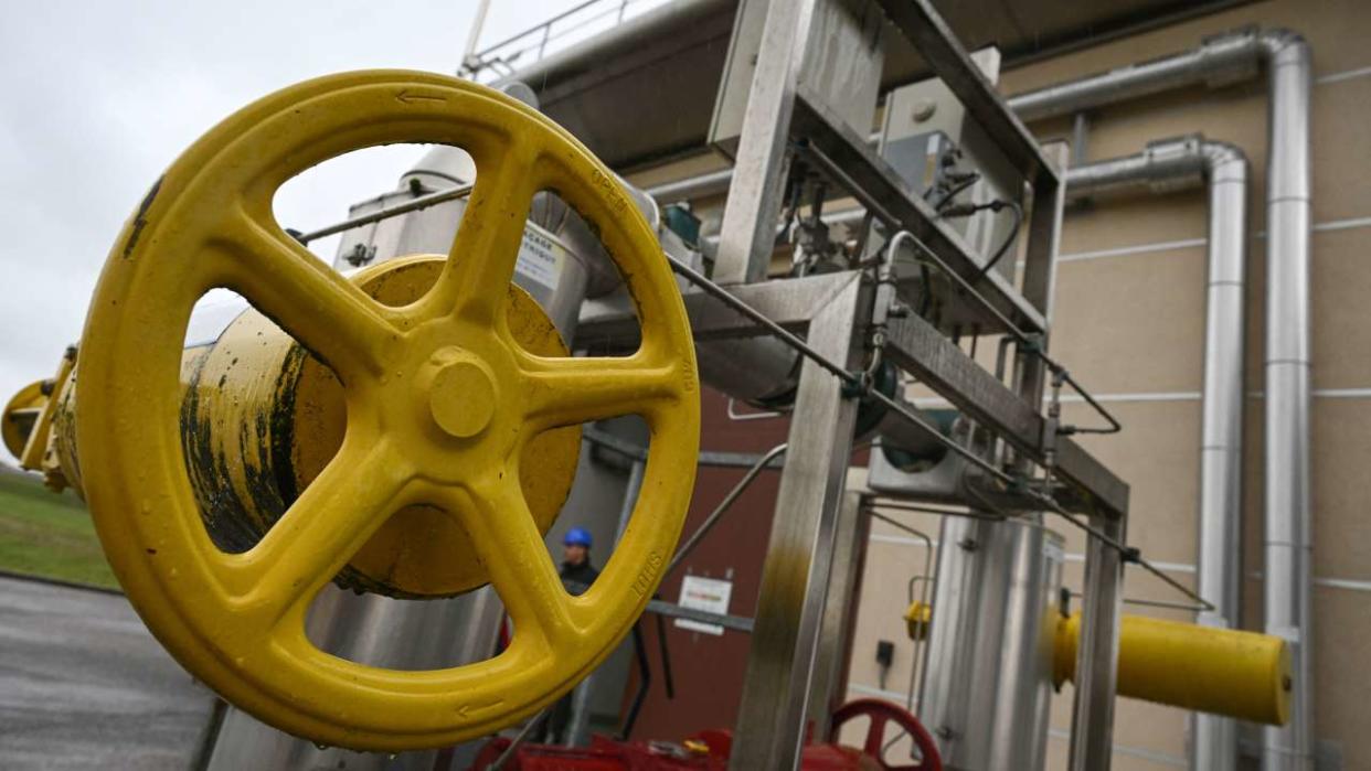 A picture taken on November 28, 2022, shows a handwheel on gas pipes at a GRTgaz compressor station, in Morelmaison, eastern France. - A compressor station is a facility which helps the transportation process of natural gas from one location to another. Natural gas, while being transported through a gas pipeline, needs to be constantly pressurized in certain distance intervals (around 200km). GRTgaz owns and operates the longest high-pressure natural gas transmission network in Europe (Photo by SEBASTIEN BOZON / AFP)