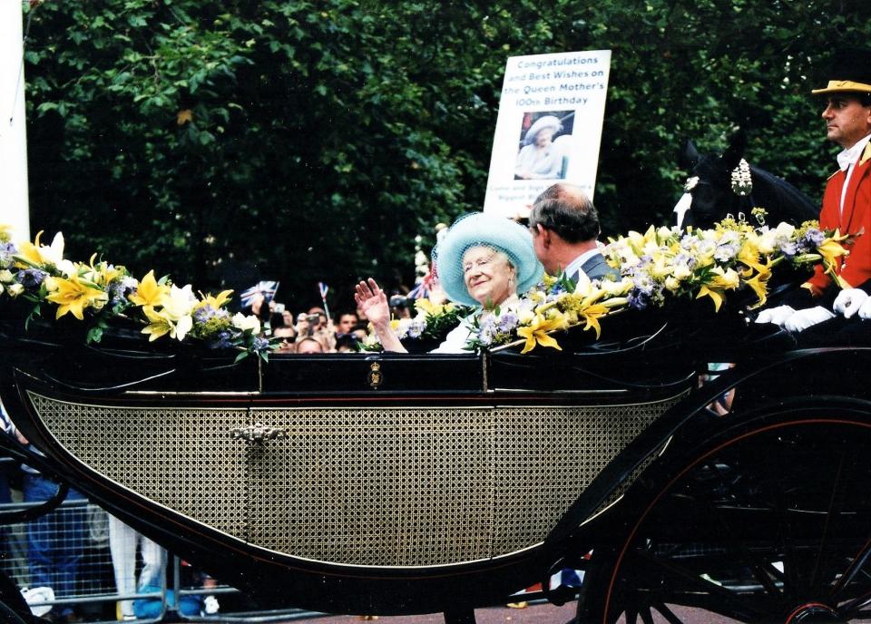 HM The Queen Mother and Prince Charles take part in a carriage drive down The Mall, London