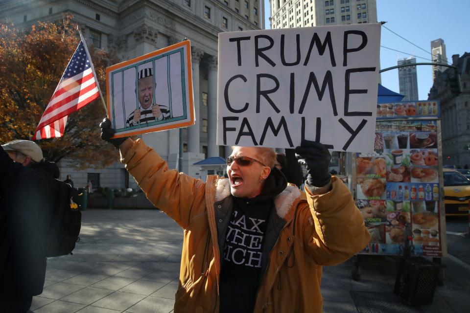 People heckle Donald Trump Jr., former President Donald Trump's son, as he enters New York State Supreme Court for his civil fraud trial on November 13, 2023 in New York City. Former President Trump has testified in the case that alleges he and his two sons Don Jr. and Eric Trump conspired to inflate his net worth on financial statements provided to banks and insurers to secure loans. New York Attorney General Letitia James has sued seeking $250 million in damages.