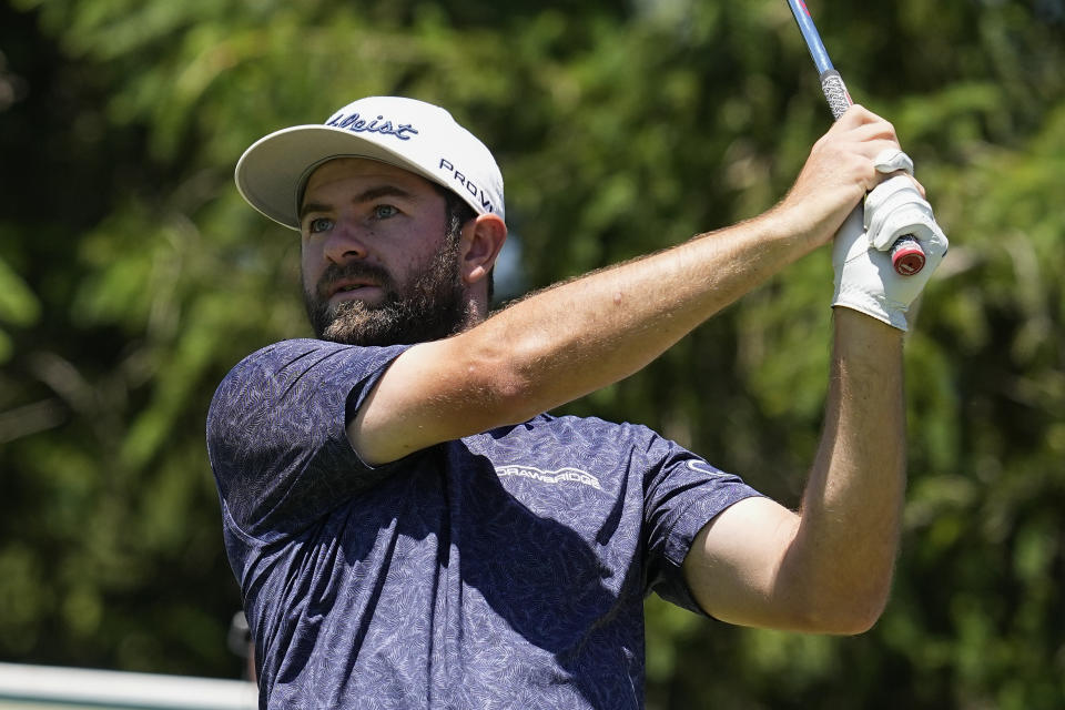 FILE - Cameron Young hits from the eighth tee during the second round of the Memorial golf tournament Friday, June 3, 2022, in Dublin, Ohio. Young will compete on the American team at the Presidents Cup beginning Thursday, Sept. 22. (AP Photo/Darron Cummings, File)