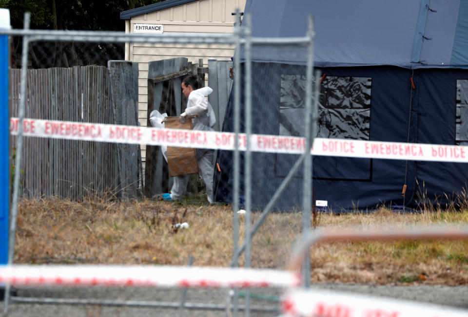 An investigator works at the site of Friday’s shooting, outside the Linwood Mosque, in Christchurch. Source: Reuters