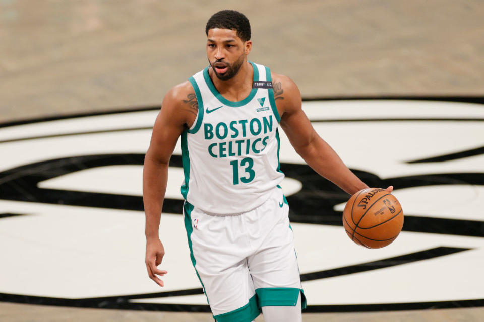 Tristan dribbling a basketball while playing for the Boston Celtics