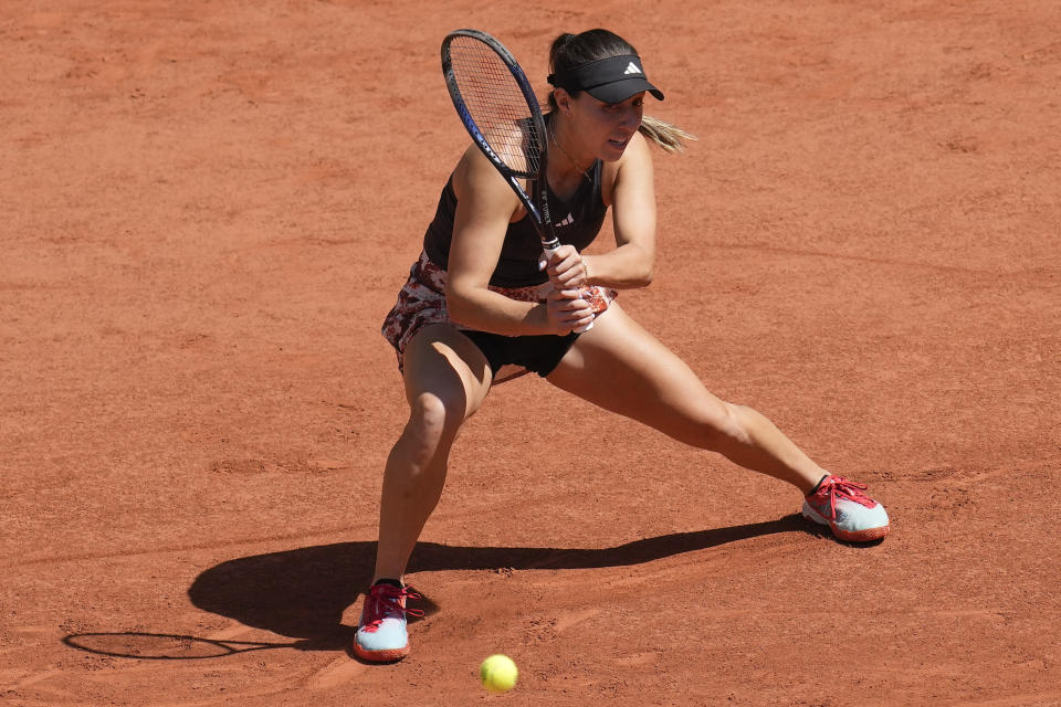 Jessica Pegula of the U.S. plays a shot against Italy's Camilla Giorgi during their second round match of the French Open tennis tournament at the Roland Garros stadium in Paris, Wednesday, May 31, 2023. (AP Photo/Christophe Ena)