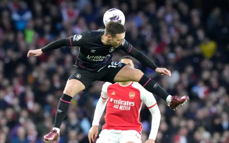 Luton Town's Jordan Clark in action during the English Premier League soccer match between Arsenal and Luton Town at the Emirates Stadium, London, Wednesday, Apr. 3,