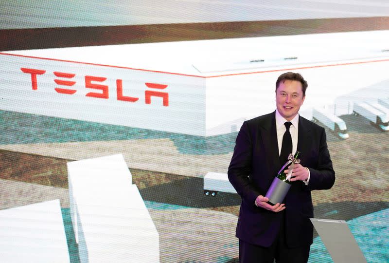 FILE PHOTO: Tesla Inc CEO Elon Musk attends an opening ceremony for Tesla China-made Model Y program in Shanghai