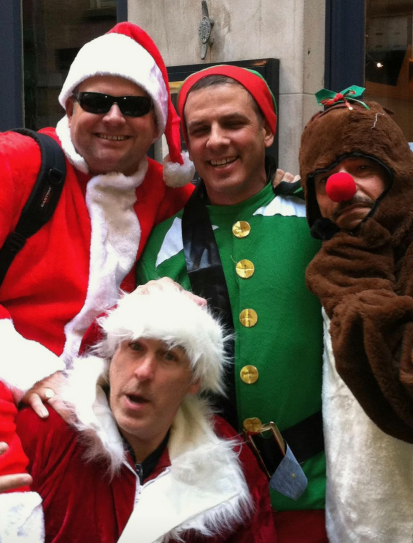 Former Public Utilities Commission of Ohio Chairman Sam Randazzo, right, is dressed as Rudolph the reindeer in a Christmas photo with Boich Comanies' Matt Evans, FirstEnergy's Michael Dowling and lobbyist David DeStefano included in a court case filed against Randazzo in Summit County. He has pleaded not guilty.