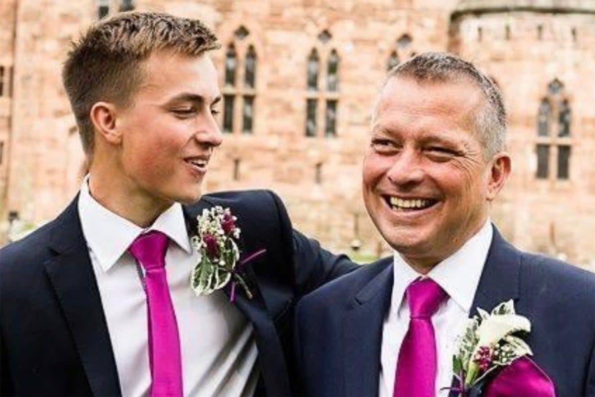 Josh Menkens (left),  with father Troy Menkens (Supplied)