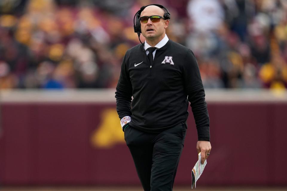 Minnesota head coach P. J. Fleck walks across the field during the first half on Saturday, Oct. 28, 2023, at Huntington Bank Stadium in Minneapolis, Minnesota.