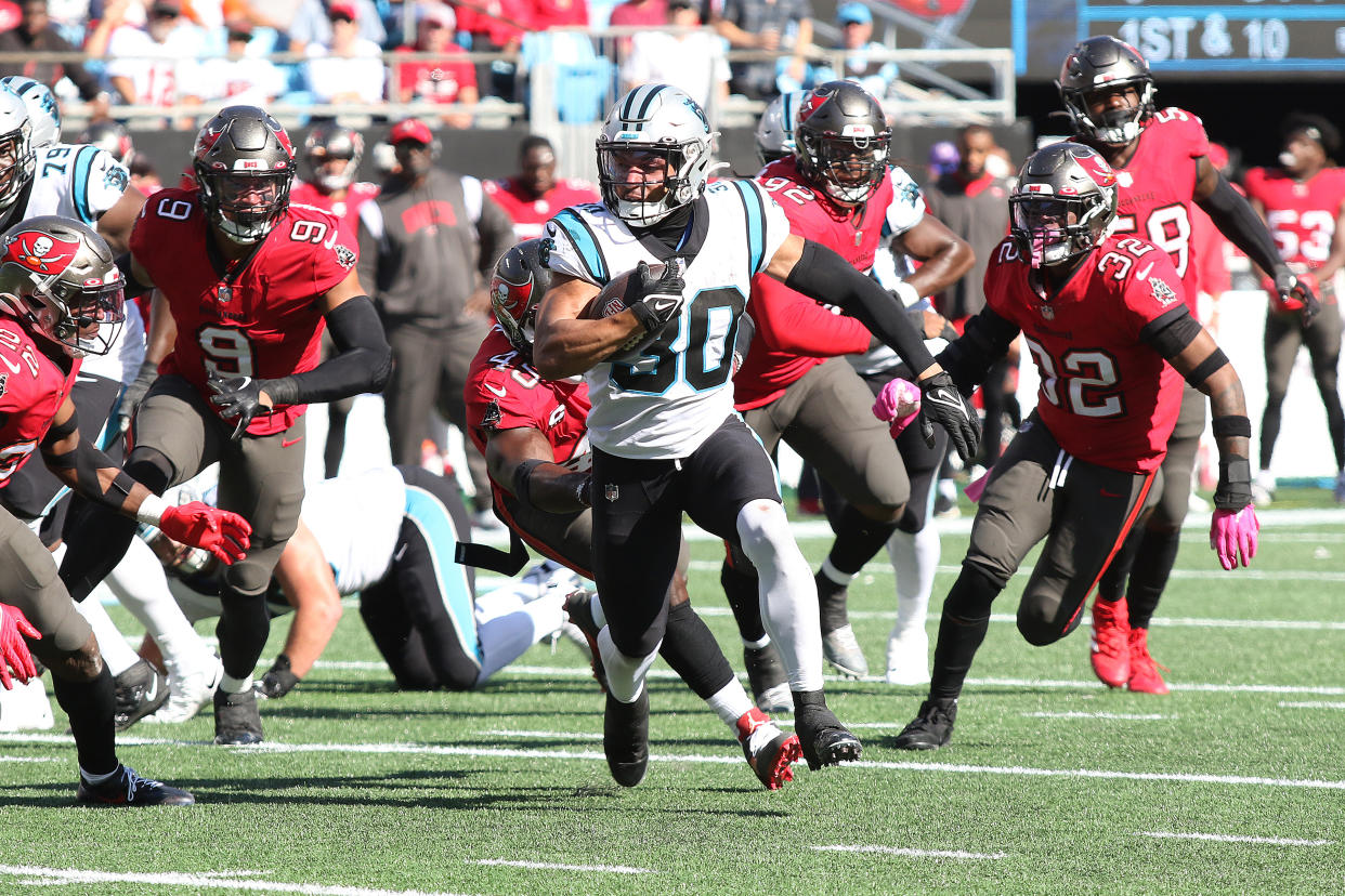 Carolina Panthers running back Chuba Hubbard (30) runs against the Tampa Bay Buccaneers earlier this season. (Photo by John Byrum/Icon Sportswire via Getty Images)