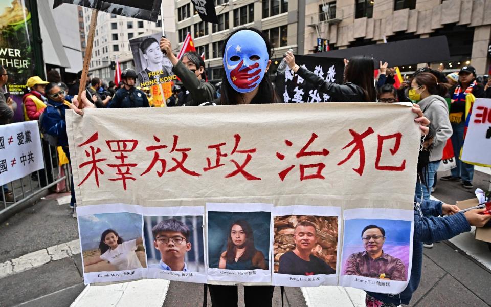 Protesters demonstrated outside Mr Xi's hotel