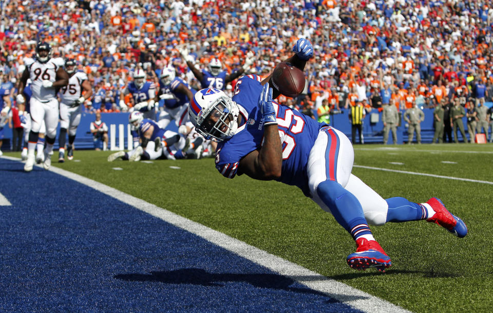 <p>Buffalo Bills fullback Mike Tolbert drops a pass from quarterback Tyrod Taylor during the first half of an NFL football game against the Denver Broncos, Sunday, Sept. 24, 2017, in Orchard Park, N.Y. (AP Photo/Jeffrey T. Barnes) </p>