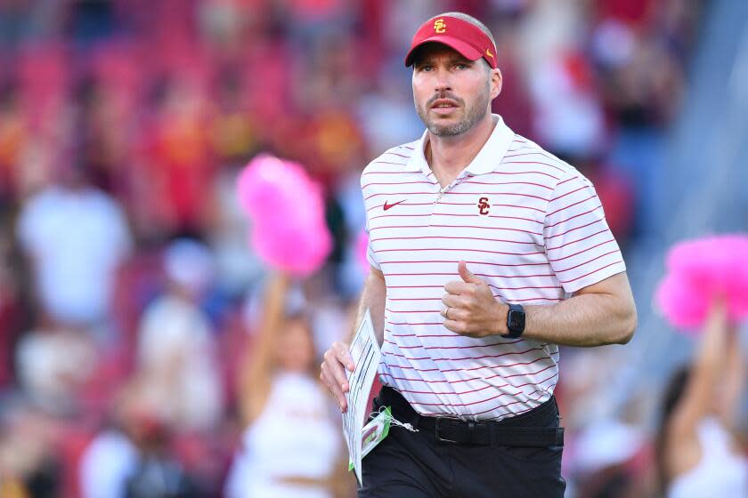 LOS ANGELES, CA - OCTOBER 21: USC Trojans defensive coordinator Alex Grinch looks on.