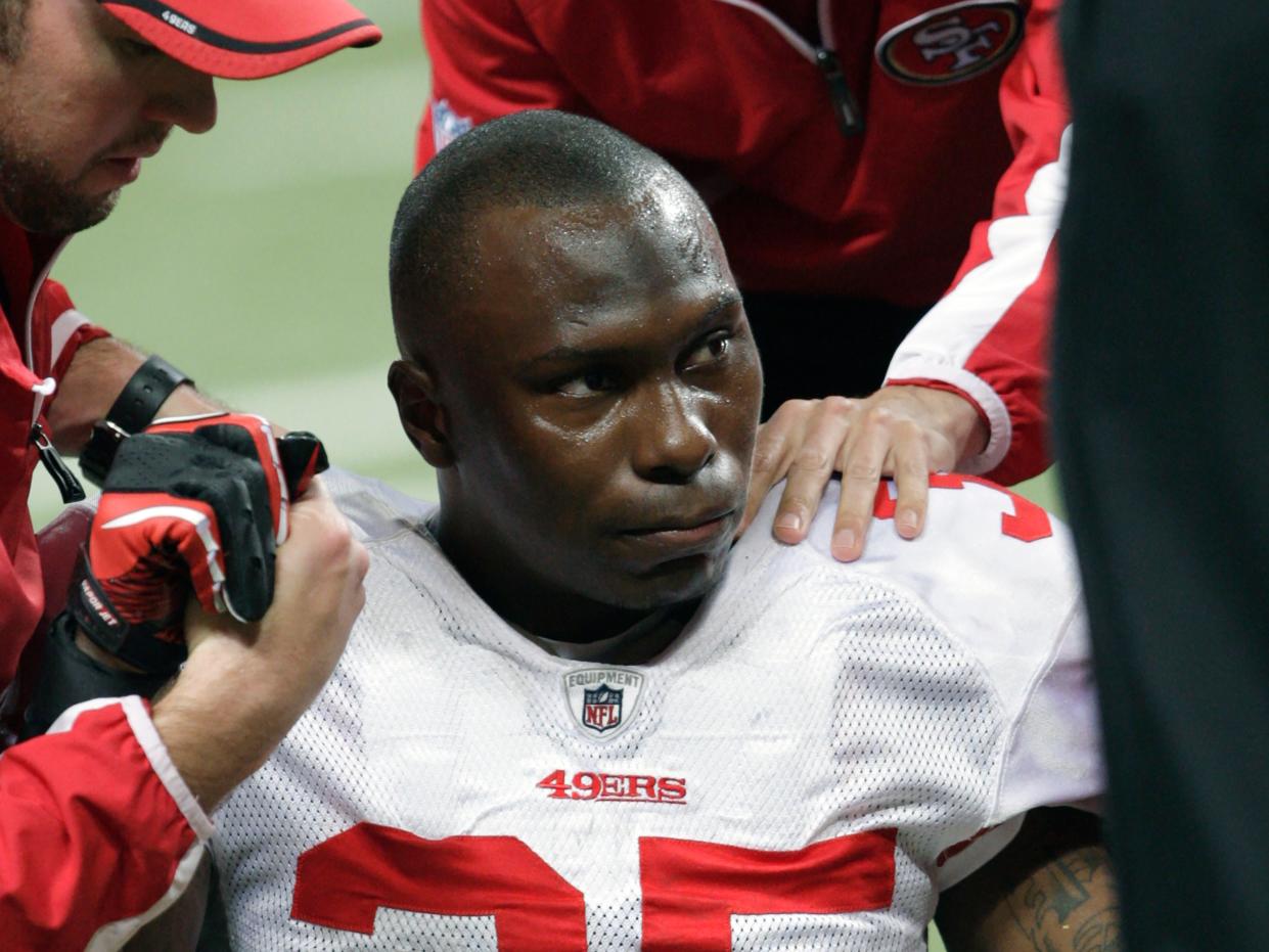 <p>San Francisco 49ers cornerback Phillip Adams is attended to after injuring his left leg during the third quarter of an NFL football game against the St Louis Rams, in St Louis</p> (AP)