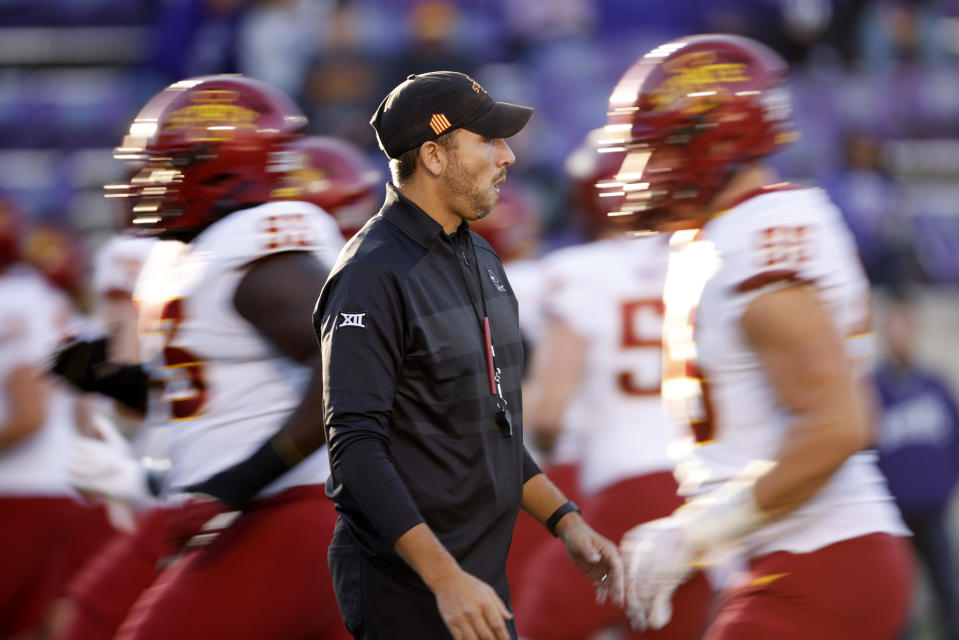 Iowa State coach Matt Campbell watches players warm up for an NCAA college football game against Kansas State on Saturday, Oct. 16, 2021, in Manhattan, Kan. (AP Photo/Colin E. Braley)