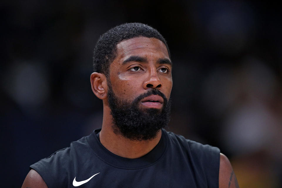 MEMPHIS, TENNESSEE - OCTOBER 24: Kyrie Irving #11 of the Brooklyn Nets warms up before a game against the Memphis Grizzlies at FedExForum on October 24, 2022 in Memphis, Tennessee. Note to Users: By downloading or using this photo, you expressly acknowledge and agree to be bound by the terms of the Getty Images License Agreement.  (Photo by Justin Ford/Getty Images)
