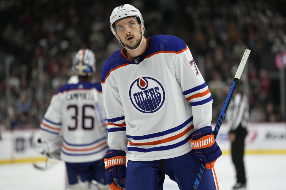 Edmonton Oilers defenseman Vincent Desharnais stands on the ice during the second period of the team's NHL hockey game against the Minnesota Wild, Tuesday, Oct. 24, 2023, in St. Paul, Minn. (AP Photo/Abbie Parr)