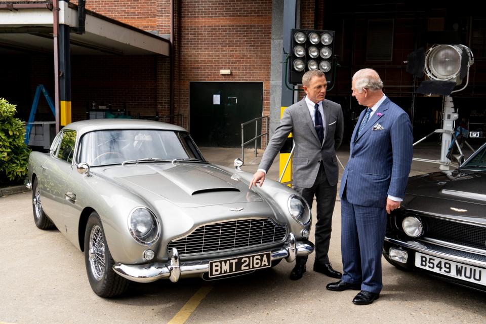 Britain's Prince Charles (R), Prince of Wales meets British actor Daniel Craig as he tours the set of the 25th James Bond Film at Pinewood Studios in Iver Heath, west of London, on June 20, 2019. - The Prince of Wales, Patron, The British Film Institute and Royal Patron, the Intelligence Services toured the set of the 25th James Bond Film to celebrate the contribution the franchise has made to the British film industry. (Photo by Niklas HALLE'N / various sources / AFP) (Photo by NIKLAS HALLE'N/AFP via Getty Images)
