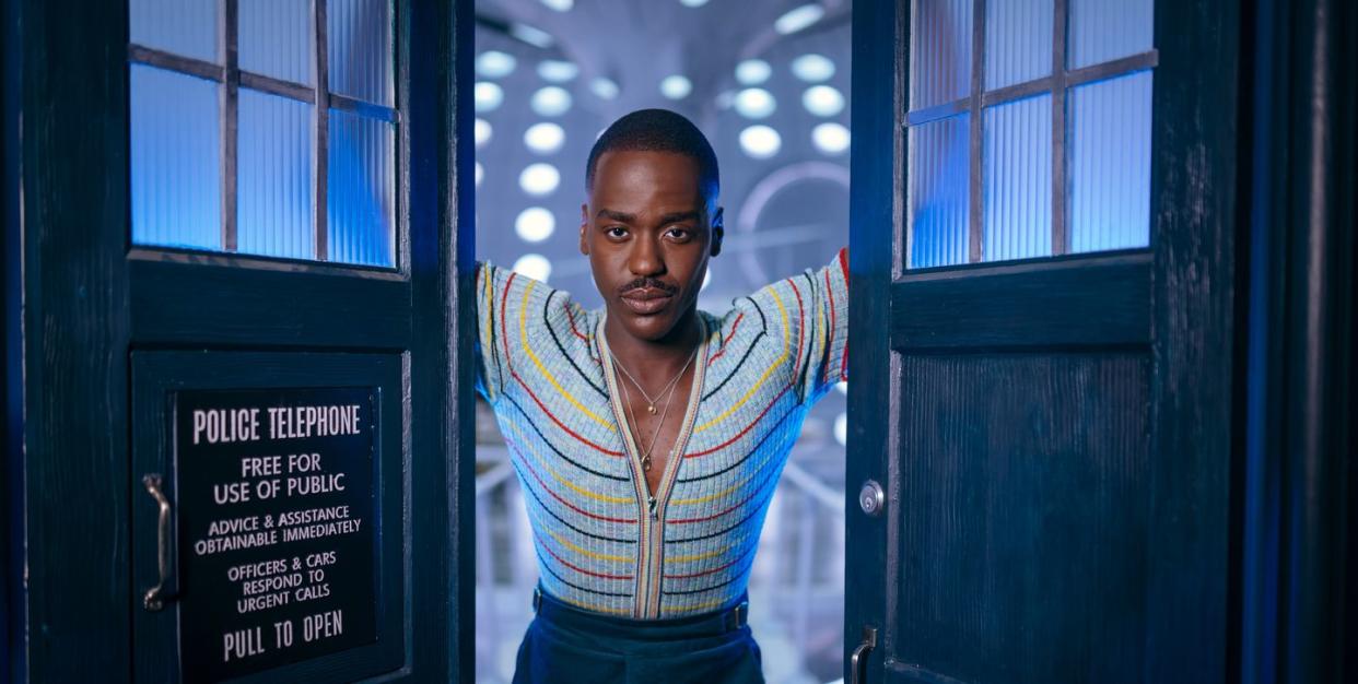 ncuti gatwa as the fifteenth doctor, standing in between the open doors of the tardis in a scene from doctor who