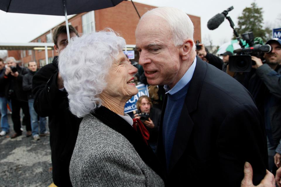 John McCain  gets a hug from his  mother, Roberta, as he arrives at a polling station on the day of South Carolina’s Republican presidential primary in Charleston, S.C., on Jan. 19, 2008.  