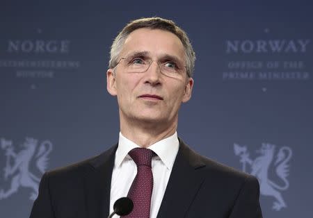 Former Norwegian prime minister Jens Stoltenberg pauses during an address to the media in Oslo, after NATO ambassadors chose him to be the next head, March 28, 2014. REUTERS/Hakon Mosvold Larsen/NTB Scanpix