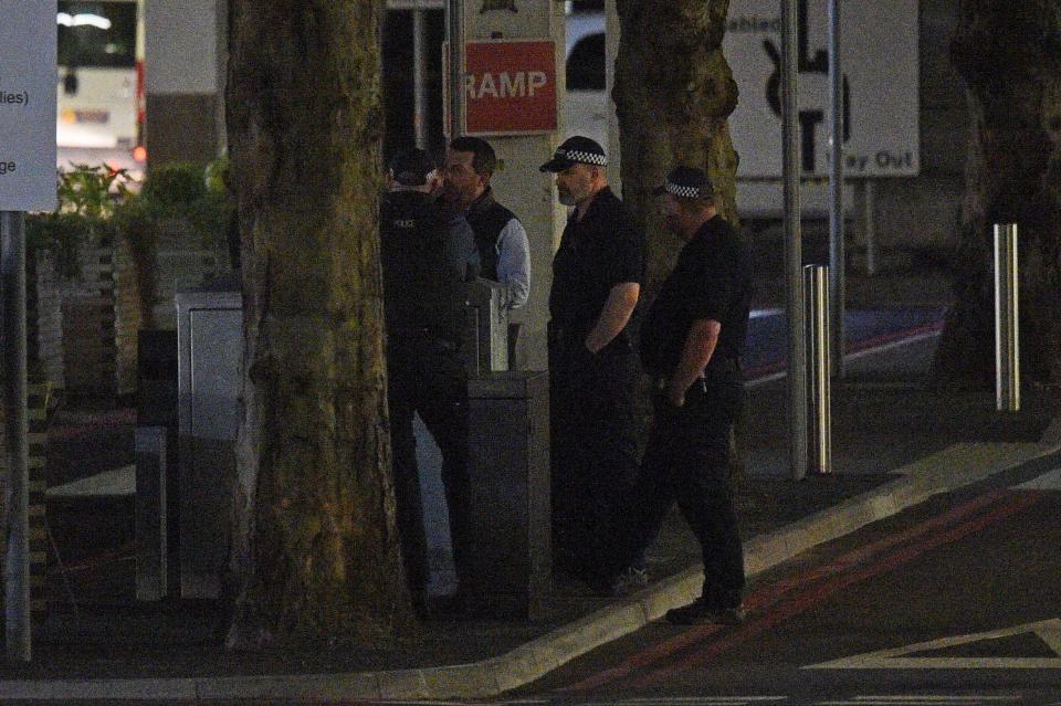 Police outside St Thomas' Hospital in central London after the PM was admitted for tests (PA)