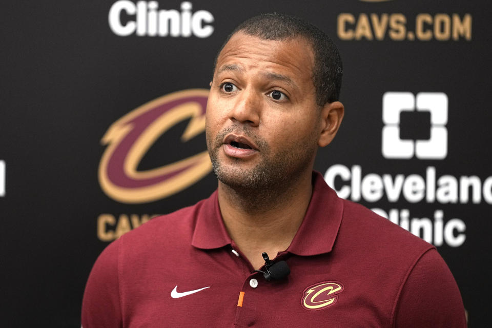 Koby Altman, president of basketball operations for the Cleveland Cavaliers, answers a question at a news conference in Brecksville, Ohio, Friday, May 24, 2024. (AP Photo/Sue Ogrocki)