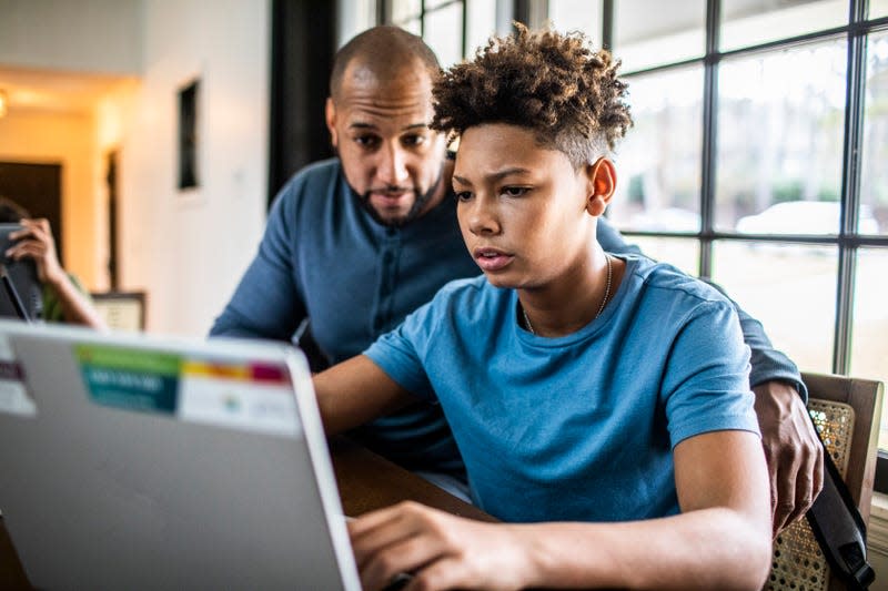 Black teacher and Kid