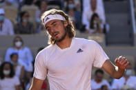 Stefanos Tsitsipas of Greece reacts as he plays Serbia's Novak Djokovic during their final match of the French Open tennis tournament at the Roland Garros stadium Sunday, June 13, 2021 in Paris. (AP Photo/Michel Euler)