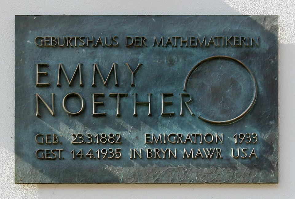 An old metal plaque with Emmy Noether's name on it, some dates, and a large circle.