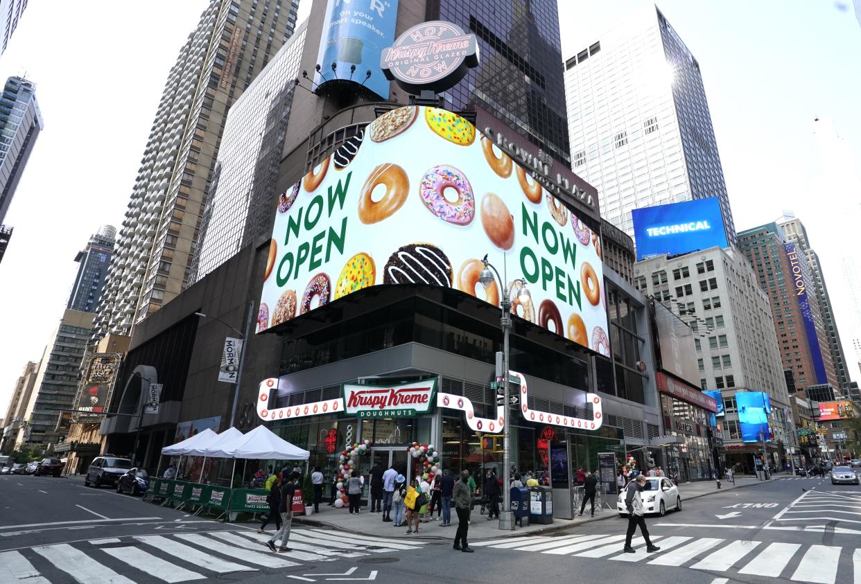Outside view of the new Krispy Kreme flagship store amid the coronavirus pandemic in Times Square, New York, September 15, 2020. - The 4,500 square-foot donut shop includes a glaze waterfall, a 24-hour street pick-up window, and a system that can make more than 4,500 donuts an hour. (Photo by TIMOTHY A. CLARY / AFP) (Photo by TIMOTHY A. CLARY/AFP via Getty Images)
