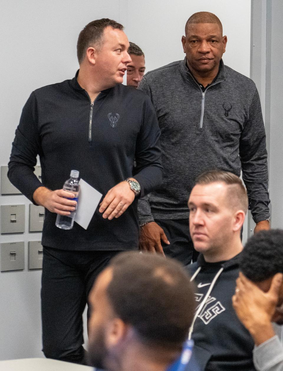 Bucks general manager Jon Horst, left, and new head coach Doc Rivers arrive at a news conference Saturday at Fiserv Forum.