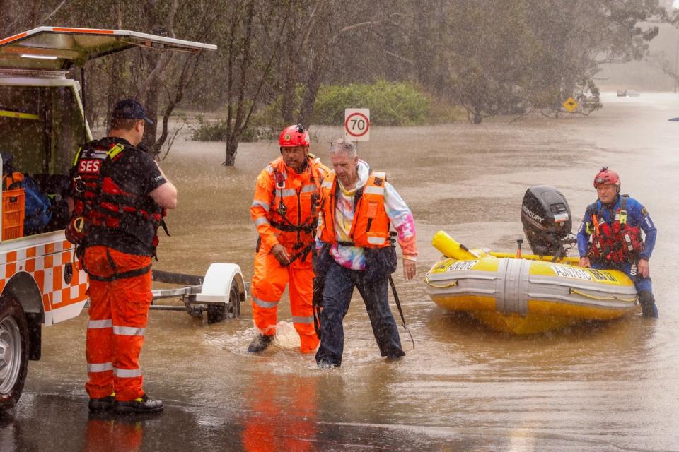 A man is rescued from his car by State Emergency Service workers in Windsor (Getty Images)