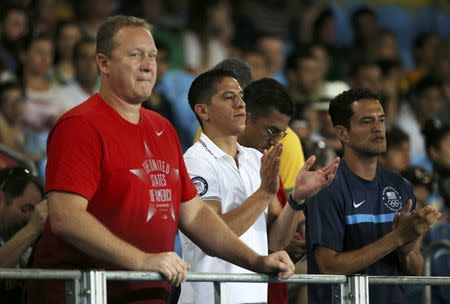 2016 Rio Olympics - Taekwondo - Preliminary - Men's -80kg Preliminary Round - Carioca Arena 3 - Rio de Janeiro, Brazil - 19/08/2016. Mark Lopez cheers on his brother Steven Lopez (USA) of USA (not pictured). REUTERS/Issei Kato