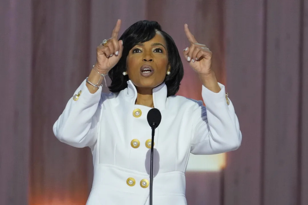 Angela Alsobrooks speaks at a podium.