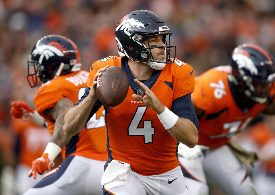 Denver Broncos quarterback Case Keenum (4) looks to throw against the Houston Texans during the first half of an NFL football game, Sunday, Nov. 4, 2018, in Denver. (AP Photo/David Zalubowski)