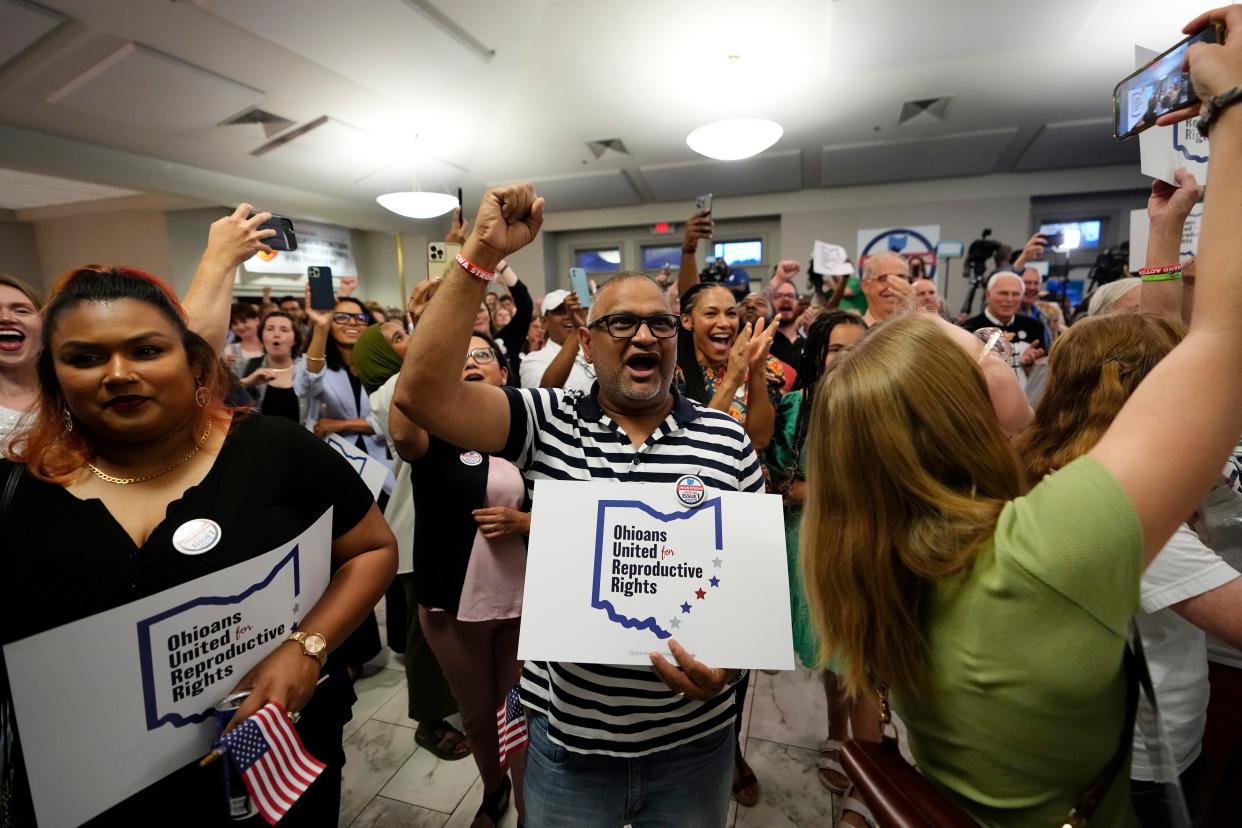 Aug 8, 2023; Columbus, Ohio, USA;  People celebrate the defeat of Issue 1 after early results were announced during an election night party at the Columbus Fire Fighters Local 67. 