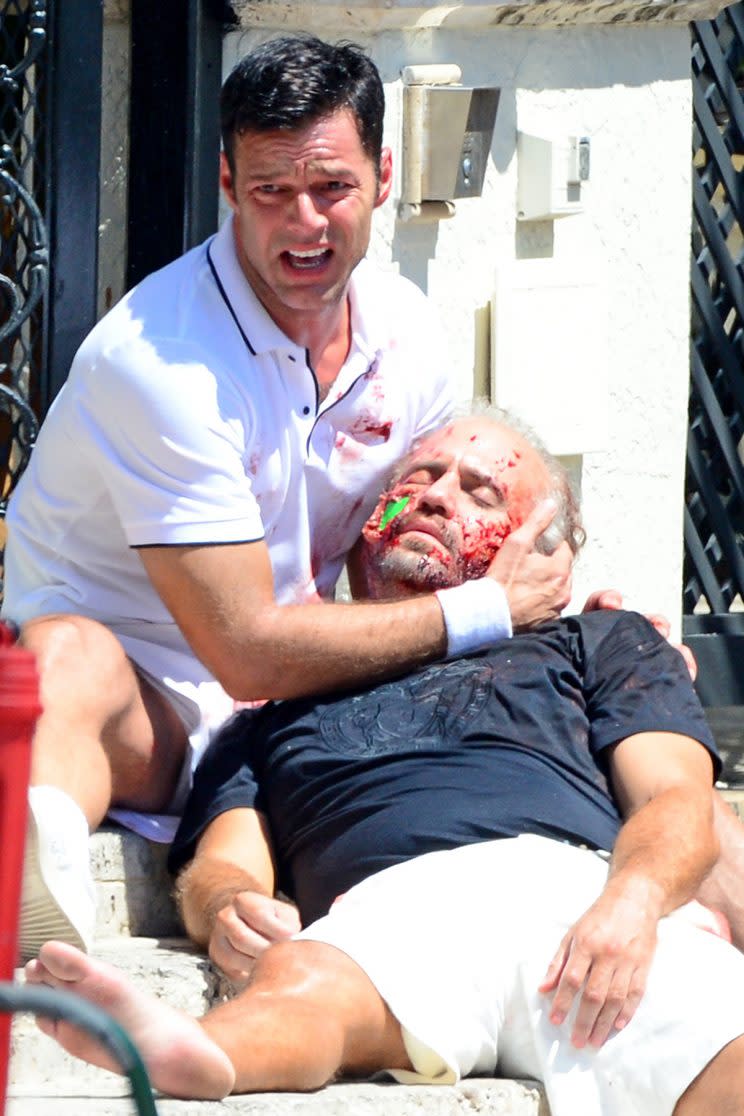 Actors Ricky Martin and Edgar Ramirez film a bloody scene for the TV series "Versace: American Crime Story" in Miami. During the scene Ricky discovers that Gianni Versace (played by Ramirez) has been shot in front of his house. (Photo: Backgrid)