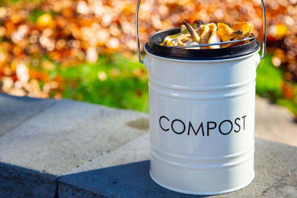 compost bin outside on top of wall