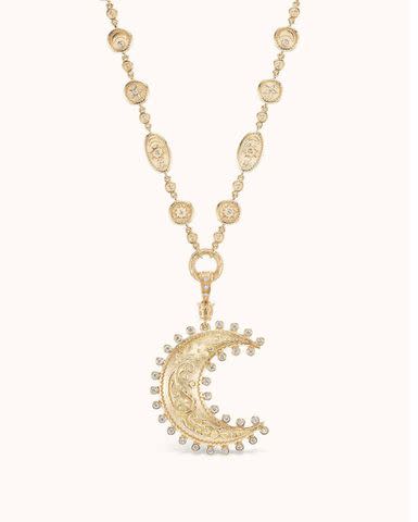 <p>Mario Laz</p> Sanchez’s necklace, a Marlo Laz piece called the Southwestern Necklace from the “Desert Rising” Collection, features a large crescent moon-shaped pendant with 88 diamonds set in 14 karat yellow gold.