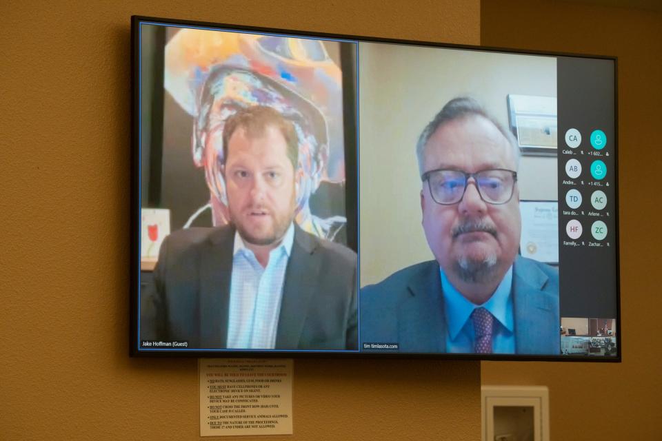 Jake Hoffman (left) and his attorney, Timothy La Sota (right), appear virtually for Hoffman’s arraignment in Maricopa County Superior Court in Phoenix on June 6, 2024. Hoffman is among those charged by a grand jury in a conspiracy stemming from the 2020 election.