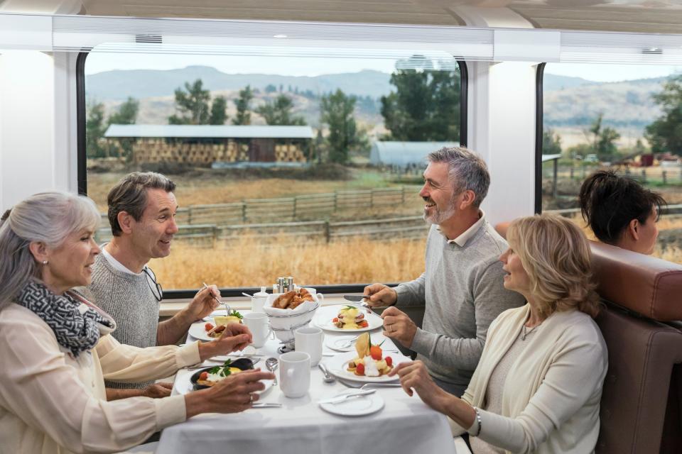<cite class="credit"><em>Photo by Rocky Mountaineer</em> | Breakfast in Rocky Mountaineer’s GoldLeaf Service dining room.</cite>